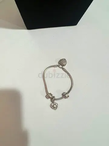 Silver charm bracelet with heart pendant - preowned