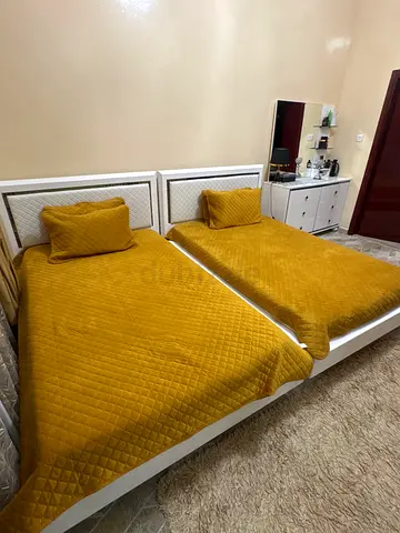 White double bed frame with mattress and drawer table