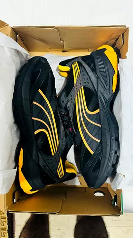PUMA FERRARI Mens black athletic sneakers with yellow lining - used, size not specified