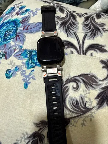 Used black smartwatch with rubber strap - good working condition