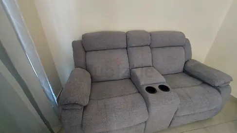 Sofa 2 seater fabric recliner with 2 cup holders storage console and USB Type Charging 7 months old