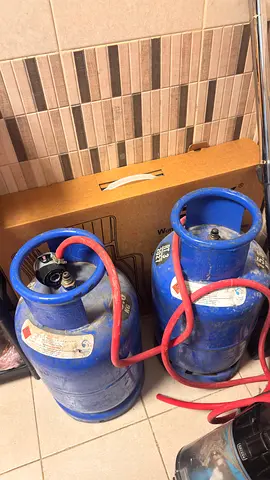 2 Nos ADNOC Gas Cylinders -Partially filled with gas