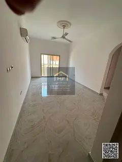 A great opportunity to live in a two-bedroom apartment with a living room in the Al Rawda area on Sh