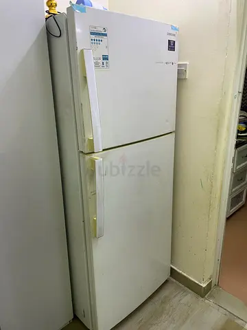 Used double-door refrigerator in good working condition