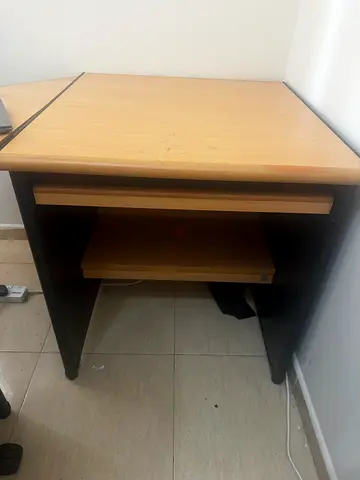 Compact wooden computer desk with keyboard shelf and office chair - good condition.