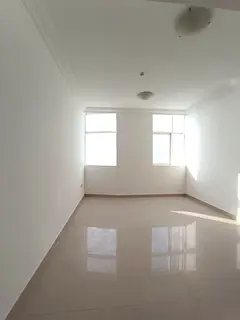 For annual rent in Sharjah – Al Taawun area Two-bedroom apartment with a living room and a balcony