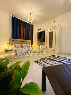 Luxury apartment, second occupancy, one bedroom and living room with a balcony and open view. Ajman,