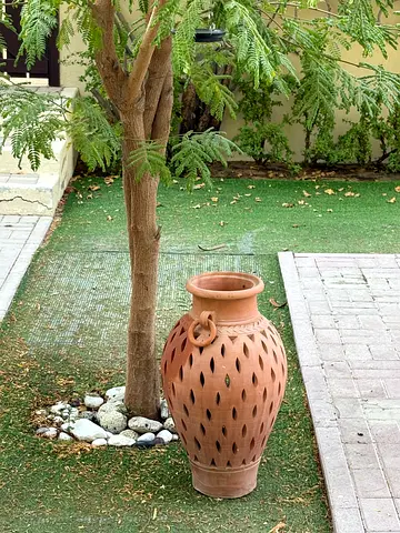 Large terracotta garden lantern/vase - decorative outdoor piece
