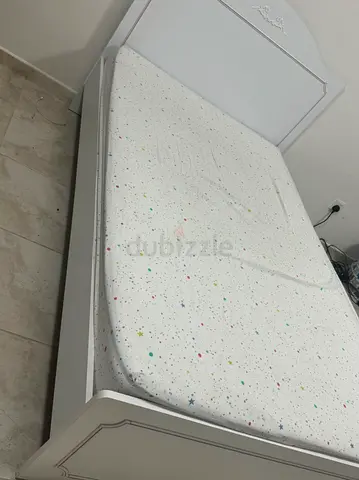 Twin elegant white bed frame with ortho mattress - good condition