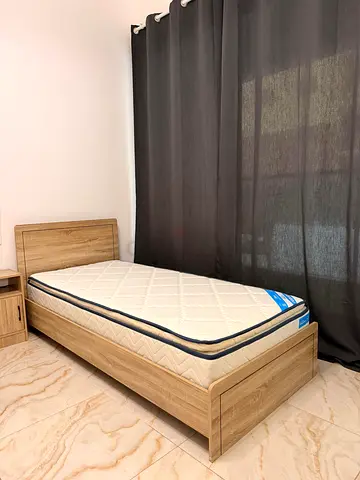 Complete bed set - as good as brand new! Single size wooden bed frame  new mattress.