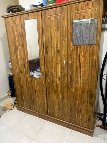 Spacious Wooden 4-Door Wardrobe with Mirror - Good Condition