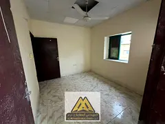 Annual 1BR apartment in Rashidiya 1, large layout, balcony, no lift, AC by tenant, AED 22,000, 4 or