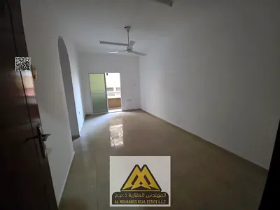 Annual 1BR apartment in Rumailah 1, 2 balconies, spacious, near Ajman Corniche & Ramada, AED 24,000, 6 cheques.