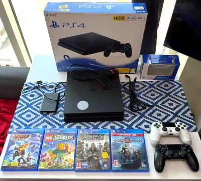 PS4 slim 500GB for Sale – Excellent Condition + 2TB External HDD + 2 Controllers + 4 Games
