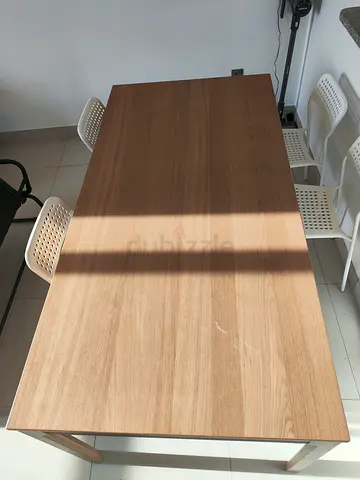 Solid wood dining table - 6 seater, good condition