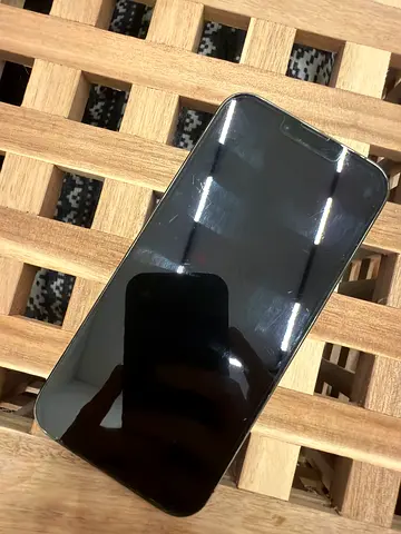 iPhone in good working condition with screen protector