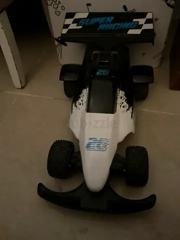 Remote control white off-road buggy (used) - sturdy toy car