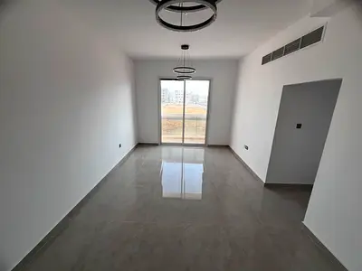 Brand new building, first occupancy - Master bedroom - Balcony - Modern finishing - Central air conditioning - Easy access to Sharjah and Dubai