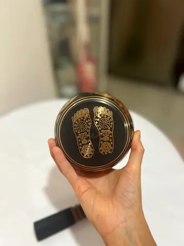 Vintage brass decorative box with engraved footprint motif
