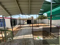 A distinctive villa for rent in Al Rawda 1, spacious majlis and hall, 3BR, prime location close to a