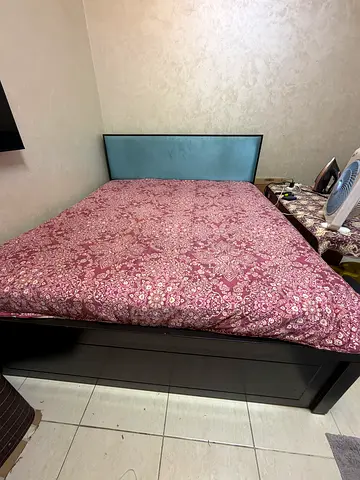 Queen-size wooden bed frame with headboard – good condition