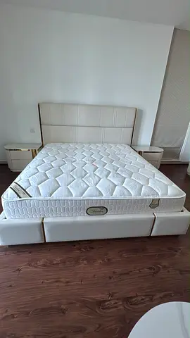 White bed frame with matching dresser, sofa and coffee table - complete bedroom set