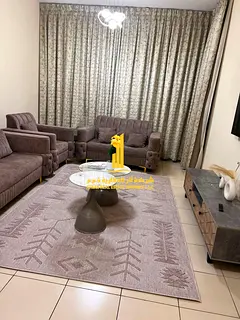 Luxury apartment, second occupancy, two bedrooms, living room, and open balcony. Ajman One Tower. Fu