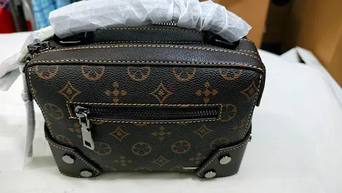Brown monogram crossbody shoulder bag - compact everyday bag Lv Disgin.and one Coach both for 500dhs