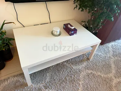 White modern coffee table with lower shelf - good condition