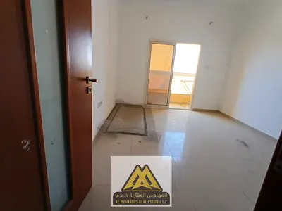 Separate living room | Very spacious | Balcony | Central air conditioning | Prime location | Close to all amenities | Easy access to Sharjah and Dubai