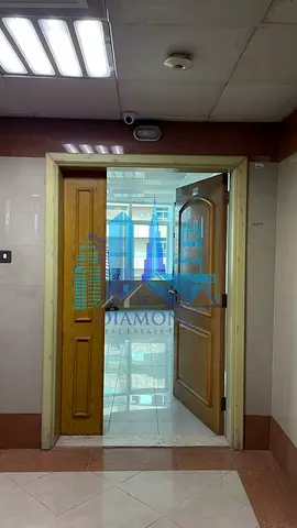 A clean office in Ajman Horizon Towers,Downtown for rent without parking.