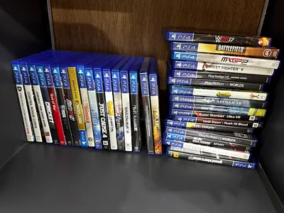 Full unused set of Ps4 with 2 remotes, VR set , VR aim controller, 2 move controller and 35 games