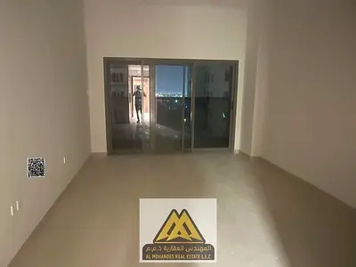 Annual studio at Azha Garden Residence, Al Amerah, balcony, central AC, built-in wardrobes, free maintenance, AED 27,999, 4 cheques.