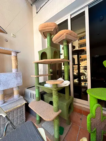 Large multi-level cat tree with condos and scratching posts - used