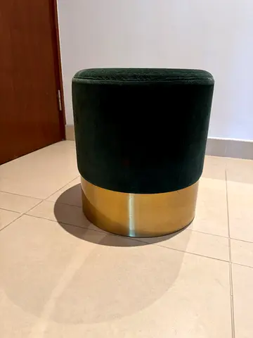 Green velvet ottoman