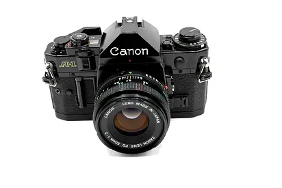 Canon A-1 35mm SLR with 50mm f/1.8 Lens - Good Working Condition