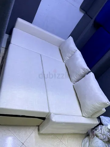 Comfortable Cream Fabric Sofa Bed with Cushions