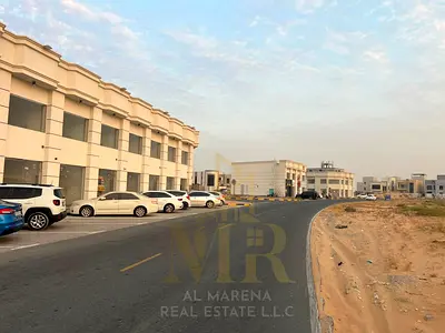 🏢 Commercial land for sale in Al Zahia – Ajman | Prime investment location opposite Mohammed Bin Zayed Road and behind Al Qabail Hypermarket | Ground