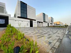 Luxury two-story villa with a rooftop terrace, conveniently located near amenities. Freehold ownersh