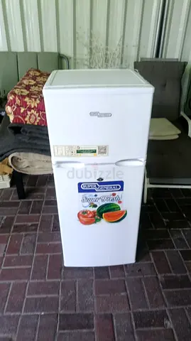 Small white top-freezer refrigerator - used, working