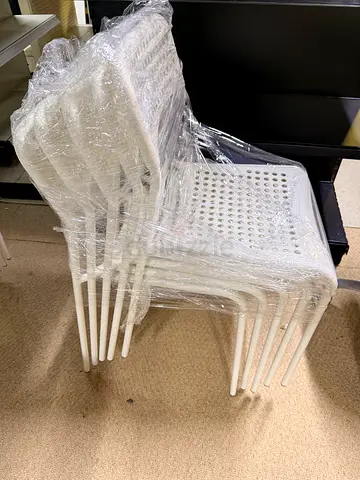 Stack of 20 White Plastic Indoor/Outdoor Chairs - Good Condition