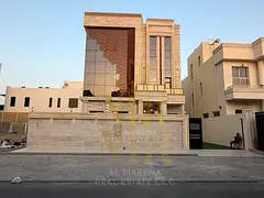 The epitome of luxury and privacy in Al-Aliya: A modern two-story villa with a private pool and roof