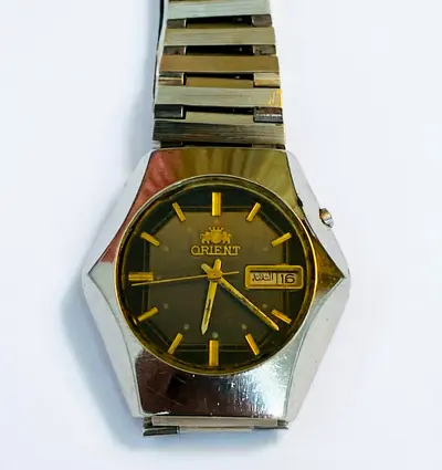1970s Rare Collectible: Orient Automatic (Vintage Gold-Tone Dial  Arabic Day‑Date Display)