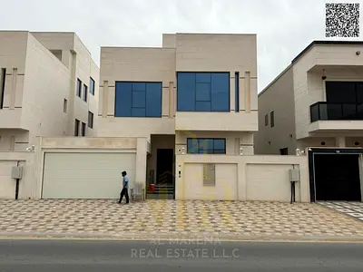 Villa in one of Ajman's most prestigious areas, on a main street, with a price including registration fees and air conditioning, located close to amen