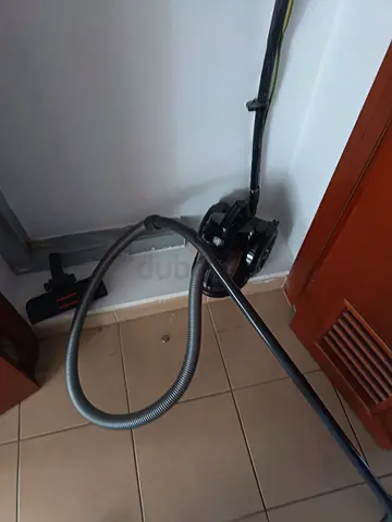 Used canister vacuum cleaner - good working condition