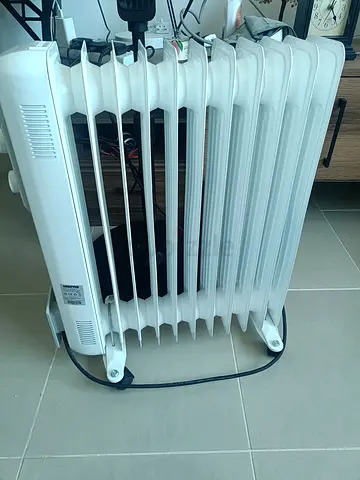 Used Oil-Filled Radiator Heater - Good Working Condition