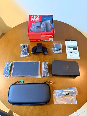 Nintendo Switch 2 - Box and accessories with genuine Nintendo carry case