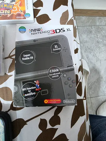 Nintendo 3d xl tra + pokemon games