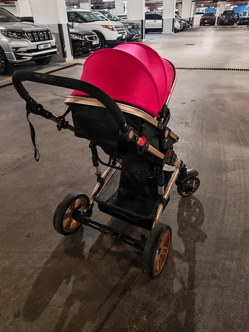 Used pink canopy standard stroller in good condition