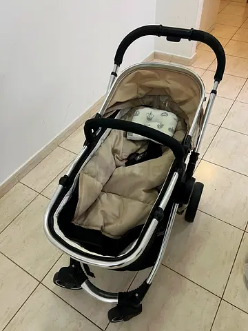 Used beige baby stroller / pram in good condition